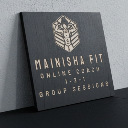 Matte black business sign with gold engraved lettering